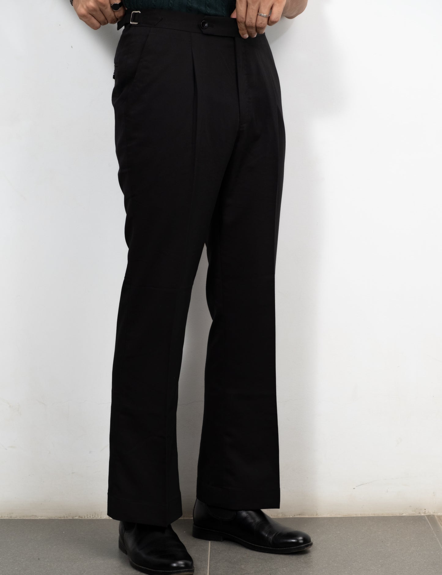 Drip Club Noiro black flared trousers worn by a model, true to size unisex fit